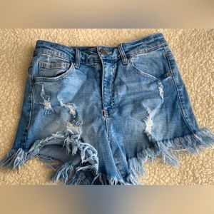 very distressed jean shorts never worn
